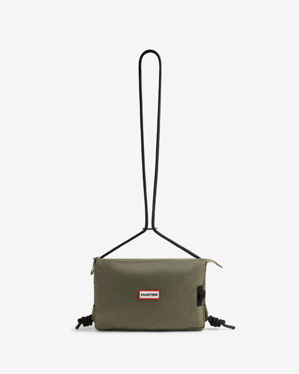 Displays the 'Hunter' branded Deep Lichen Green Dozmary Utility Ripstop Crossbody Bag