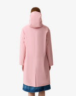 Displays a model wearing the Pink 'Hunter' branded Women's Ellis Pu Raincoat
