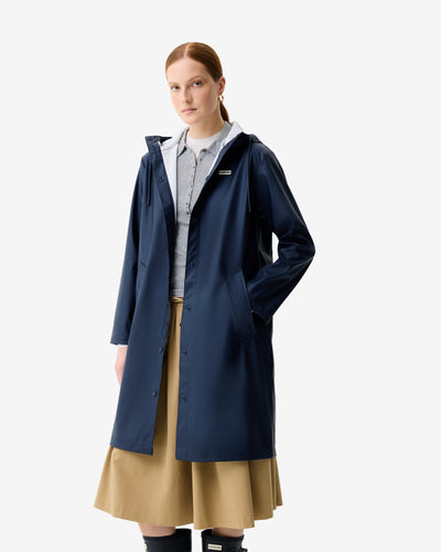 Displays a model wearing the Total Eclipse 'Hunter' branded Women's  Ellis PU Raincoat
