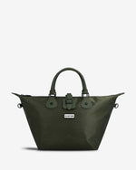 An olive green Hunter tote bag with dual top handles, a front buckle closure, and a small white Hunter logo patch, shown on a light gray background.