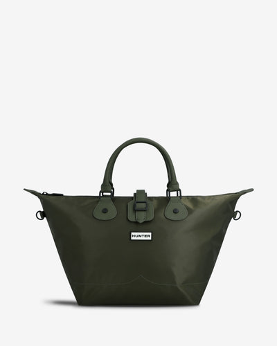 An olive green Hunter tote bag with dual top handles, a front buckle closure, and a small white Hunter logo patch, shown on a light gray background.