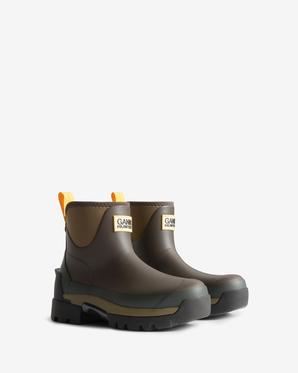 Displays a pair of the Chocolate Brown 'Hunter' branded women's GANNI X Hunter Balmoral Ankle Boot