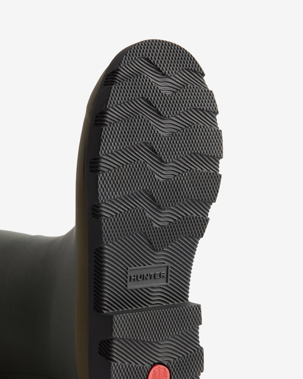 Displays the sole of the Dark Olive 'Hunter' branded Unisex GANNI X Hunter Tall Adjustable Downpour Wellington Boot