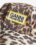 Displays the Leopard 'Hunter' branded unisex GANNI X Hunter Waterproof Bucket Hat featuring the Ganni x Hunter logo