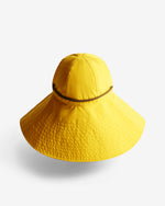 Displays the lemon 'Hunter' branded unisex GANNI X Hunter Waterproof Bucket Hat