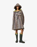 Displays a model wearing the Leopard 'Hunter' branded unisex GANNI X Hunter Waterproof Poncho