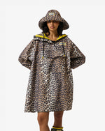 Displays a model wearing the Leopard 'Hunter' branded unisex GANNI X Hunter Waterproof Poncho