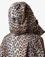 Displays a model wearing the Leopard 'Hunter' branded unisex GANNI X Hunter Waterproof Poncho