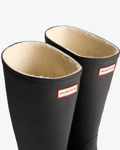 Displays a pair of the Black 'Hunter' branded Unisex Downpour Tall Insulated Wellington Boots