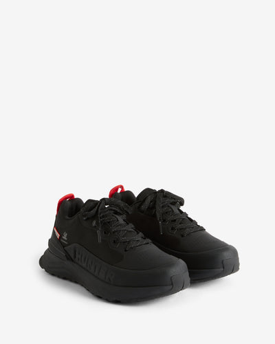 A pair of black HUNTIN sneakers with red pull tabs and a small red accent on the side, shown on a clean white background.