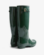 Pair of green rain boots on a white background