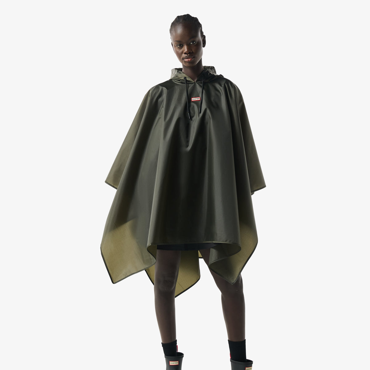 Displays the kambaba green 'Hunter' branded Unisex Packable Poncho