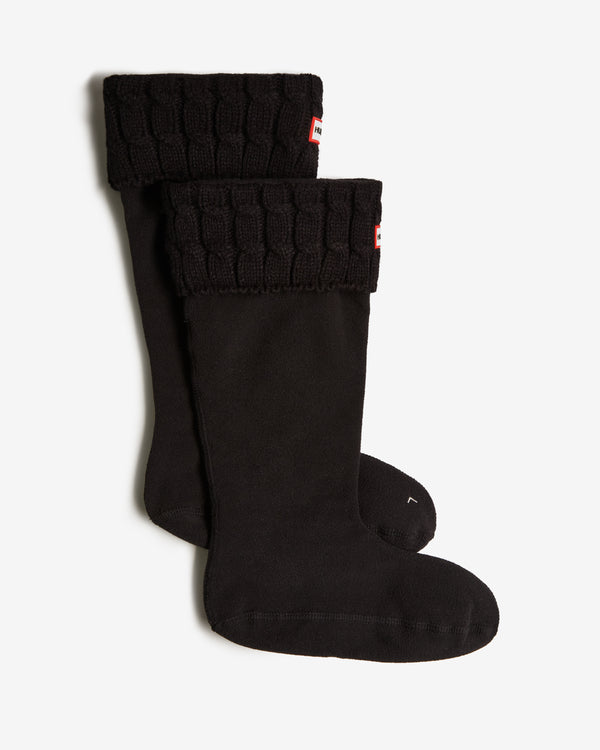 Displays a pair of Black 'Hunter' branded Recycled 6 Stitch Cable Cuff Tall Boot Socks