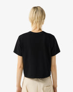 Displays a model wearing Black 'Hunter' branded Women's Essentials Logo Boxy Cropped T-Shirt