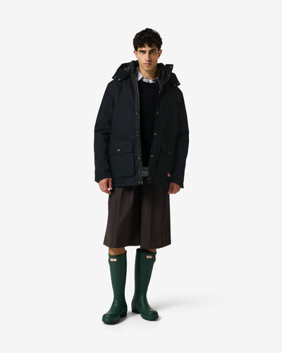 Displays a model wearing the Black 'Hunter' branded Men's Original 170 Yrs Anniversary Jacket