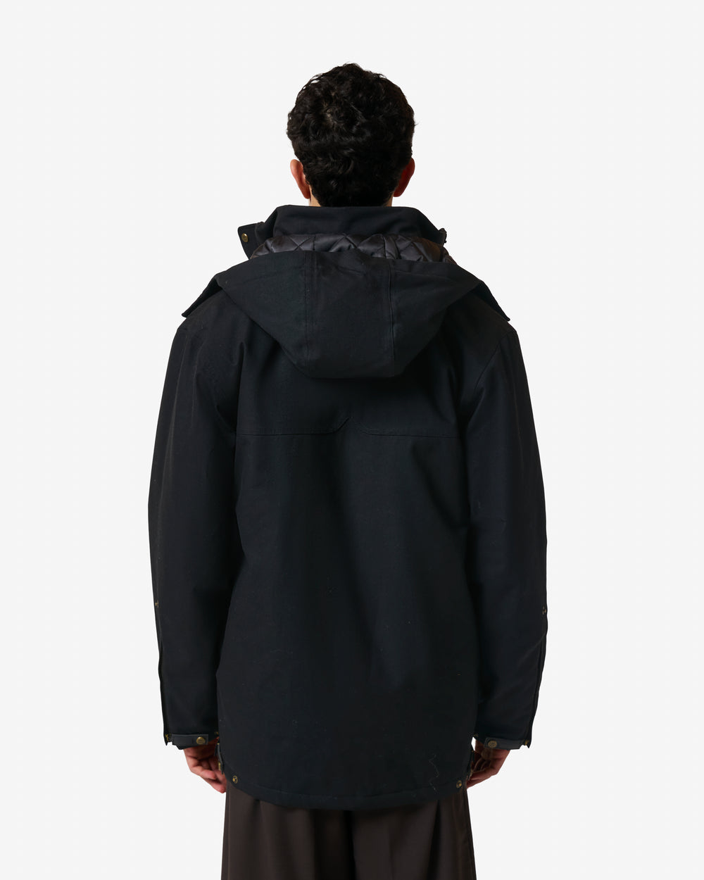 Displays a model wearing the Black 'Hunter' branded Men's Original 170 Yrs Anniversary Jacket