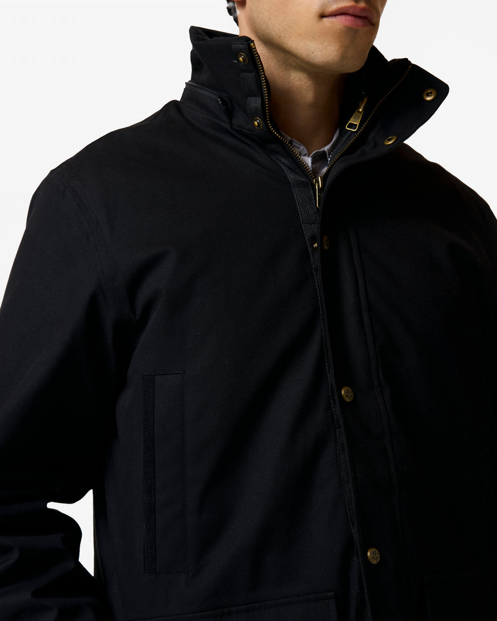 Displays a model wearing the Black 'Hunter' branded Men's Original 170 Yrs Anniversary Jacket