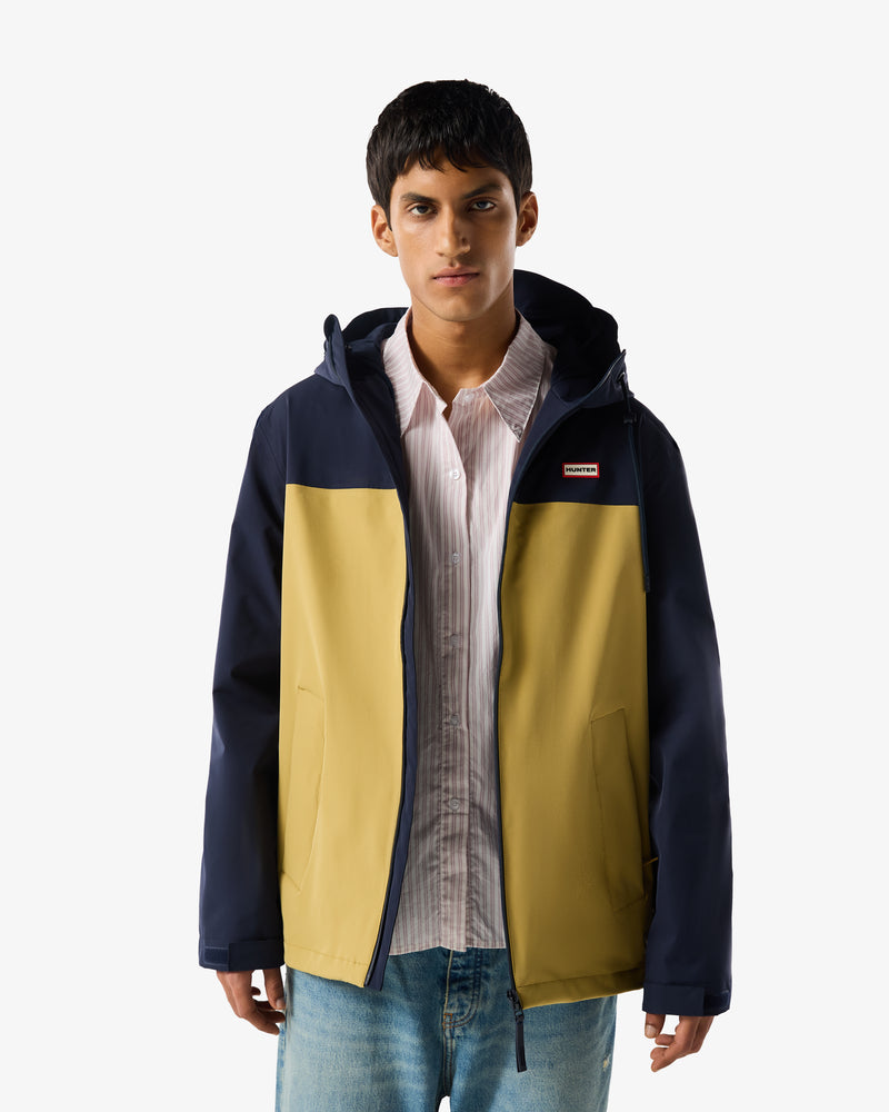 Displays a model wearing the Night Sky 'Hunter' branded Men's Originals Colour Block Waterproof Jacket