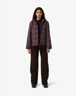 Displays a model wearing the Port Royale 'Hunter' branded Women's Original Waterproof Tartan Jacket