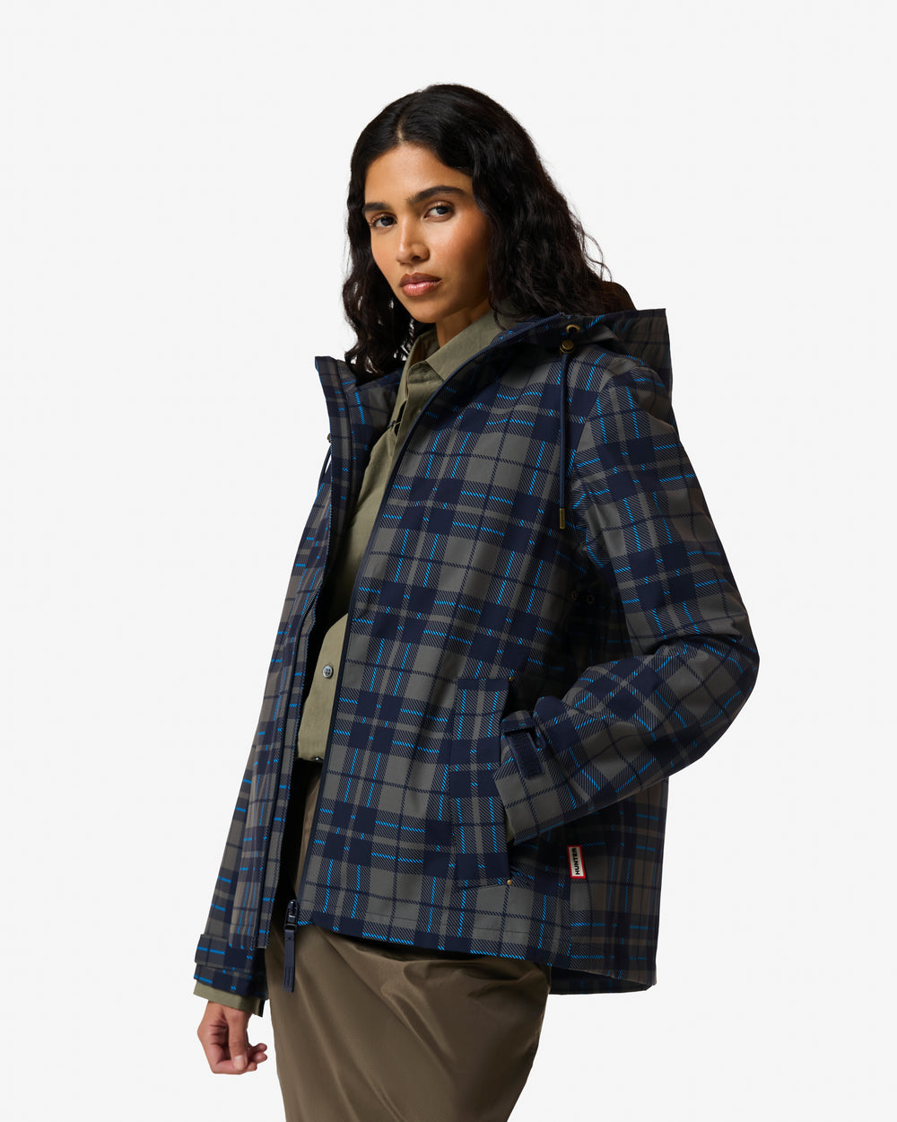 Displays a model wearing the kambaba 'Hunter' branded Women's Original Waterproof Tartan Jacket
