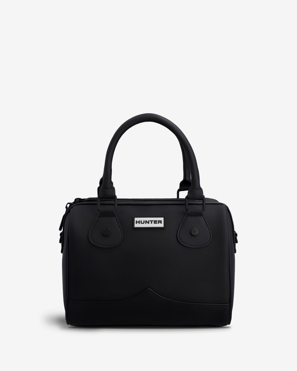 A black structured handbag with double top handles, a front flap pocket, and a small white Hunter brand plaque, photographed on a clean light gray background.