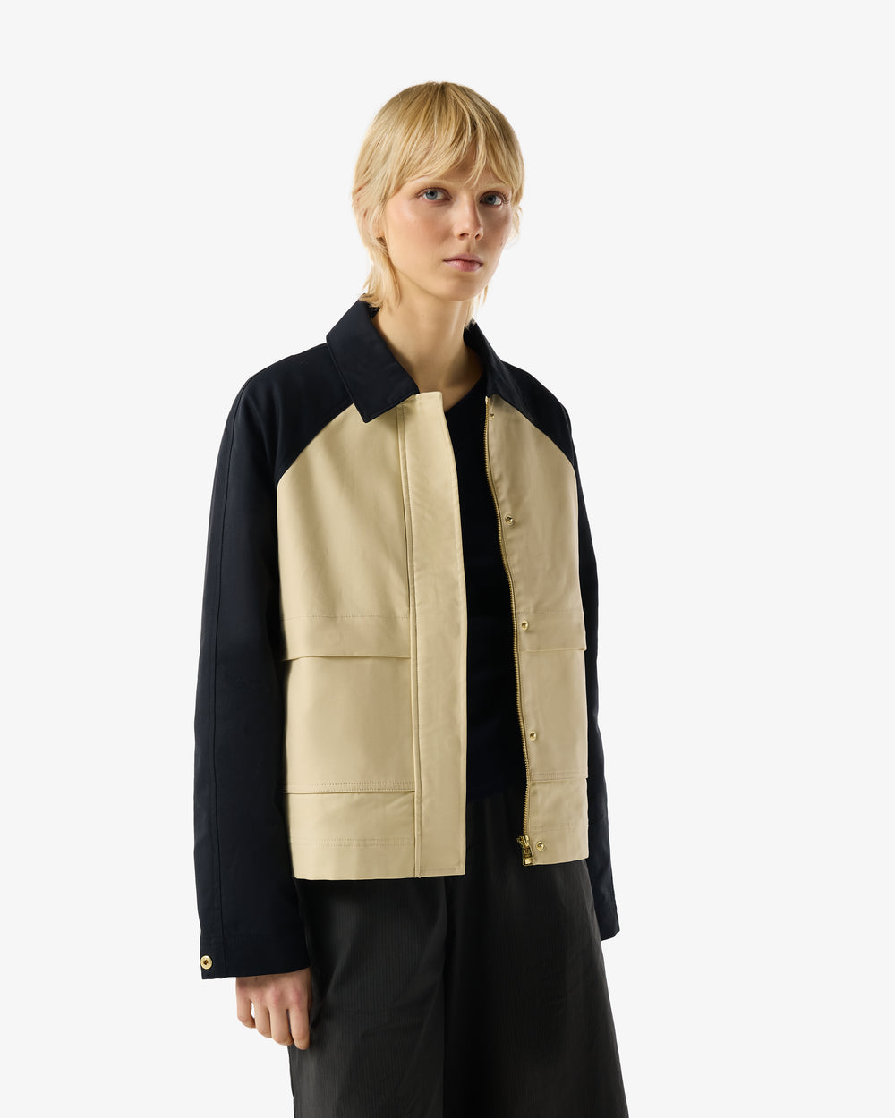 Displays a model wearing the Beige 'Hunter' branded Recrafted Cropped Jacket