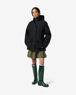 Displays a model wearing the black 'Hunter' branded Women's Original 170 Yrs Anniversary Jacket