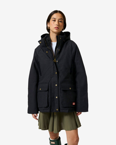Displays a model wearing the black 'Hunter' branded Women's Original 170 Yrs Anniversary Jacket
