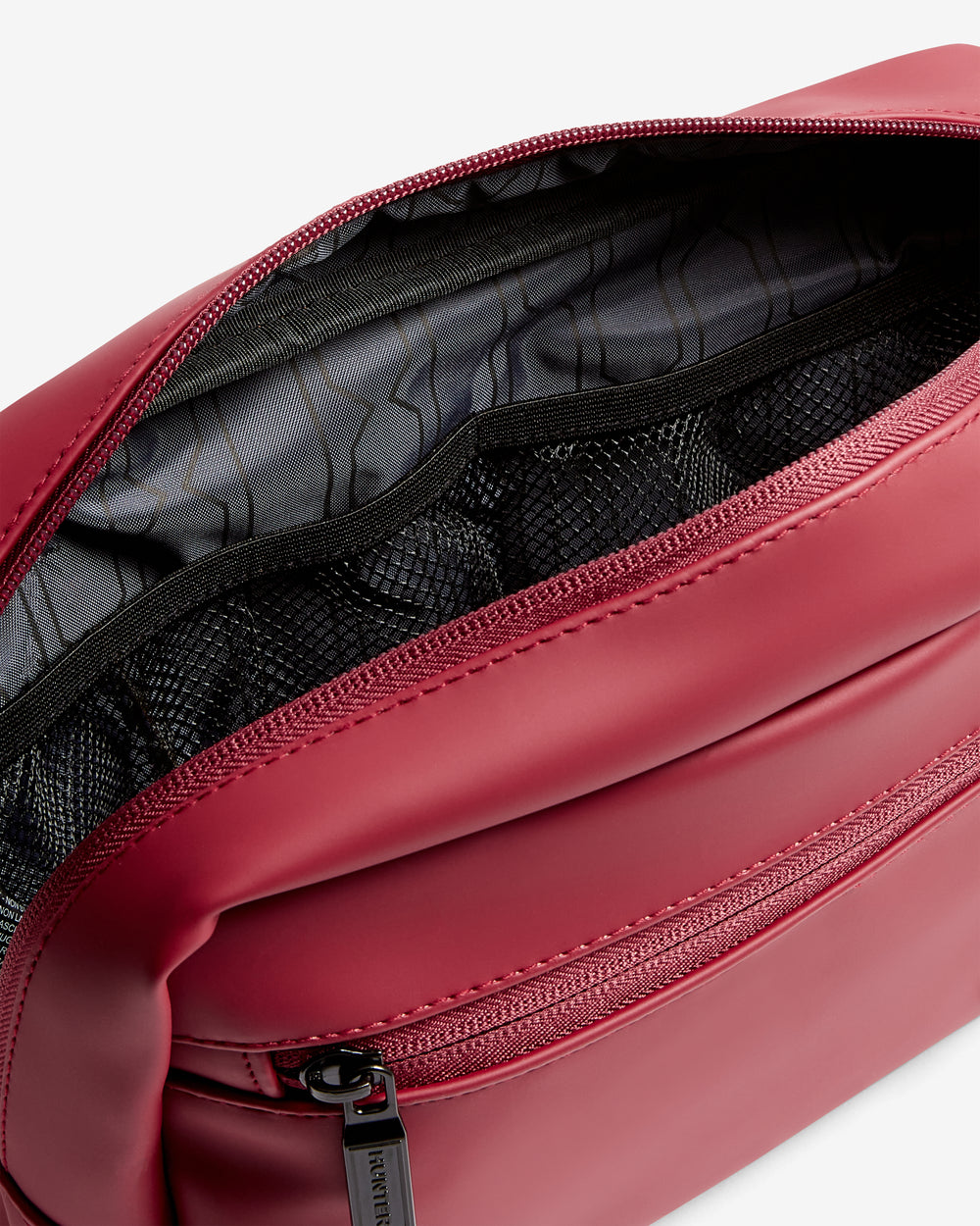 Displays the Military Red 'Hunter' branded Unisex Portare Unisex Travel Bag