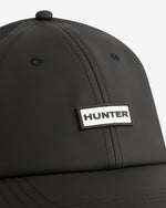 Displays the Black 'Hunter' branded Rain Pu Cap