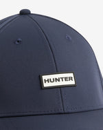 Displays the Navy 'Hunter' branded Storm Cap