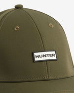 Displays the Olive Green 'Hunter' branded Storm Cap